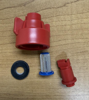 A deconstructed nozzle displaying all of its components.