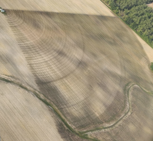 Aerial image of poor uniformity with strips of land not being irrigated in the pivot spans